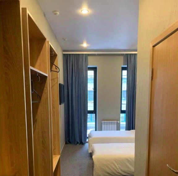 комната г Тольятти р-н Центральный ул Комсомольская 95 фото 1