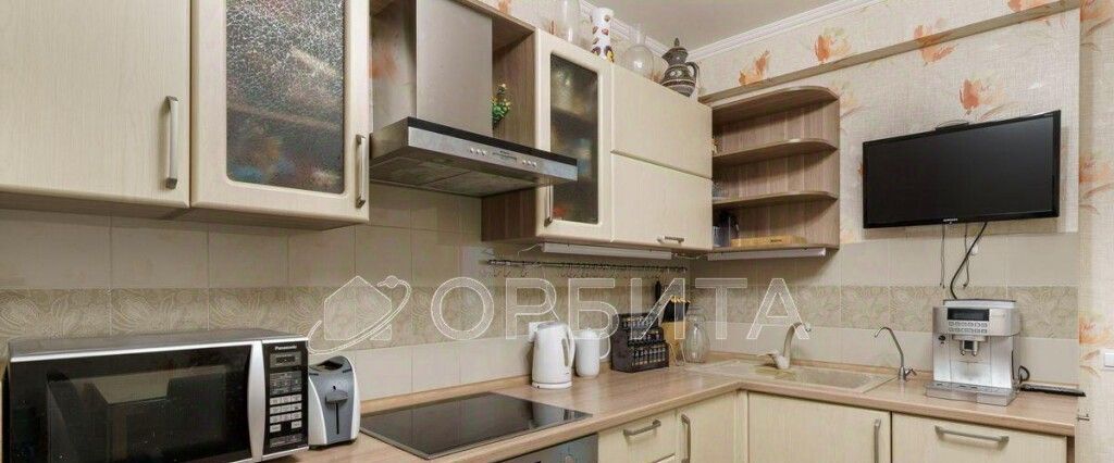 квартира г Тюмень р-н Ленинский ул 50 лет Октября 57а фото 2