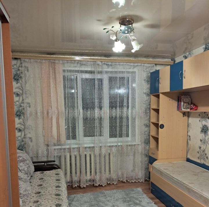 комната г Волгоград р-н Дзержинский ул Рионская 24 фото 1