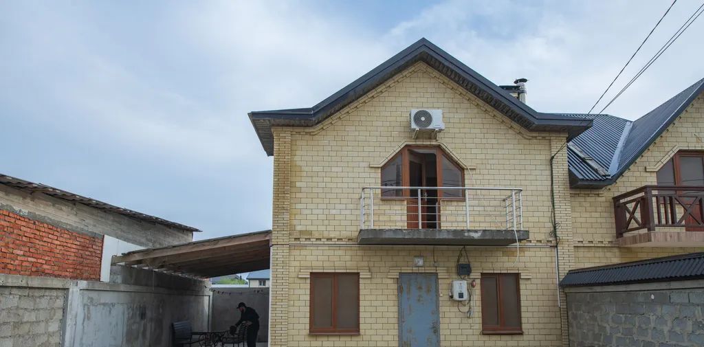 дом г Махачкала р-н Кировский микрорайон Караман-7 ул. Агамедова, 7 фото 1