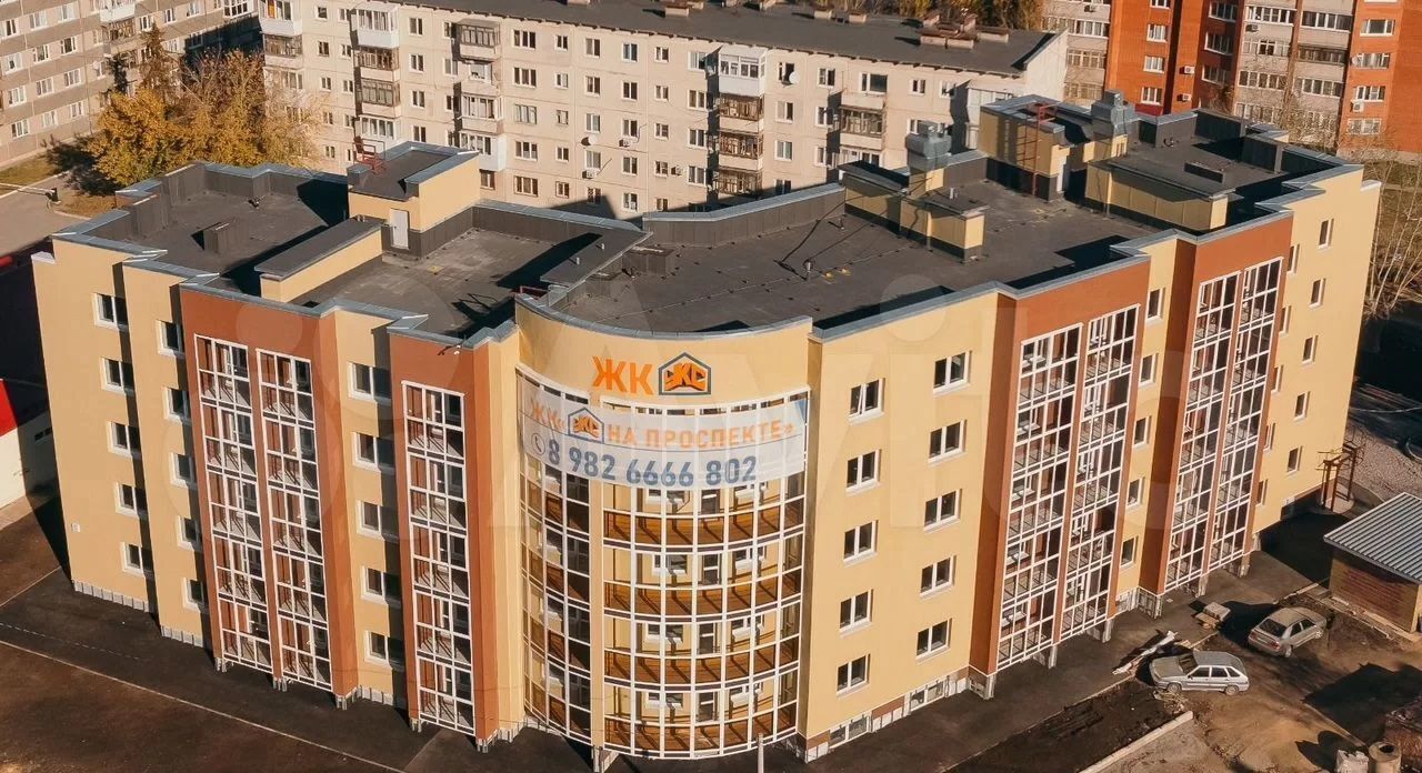 квартира г Каменск-Уральский Синарский ул Кунавина 15а дом по пр. Победы фото 1