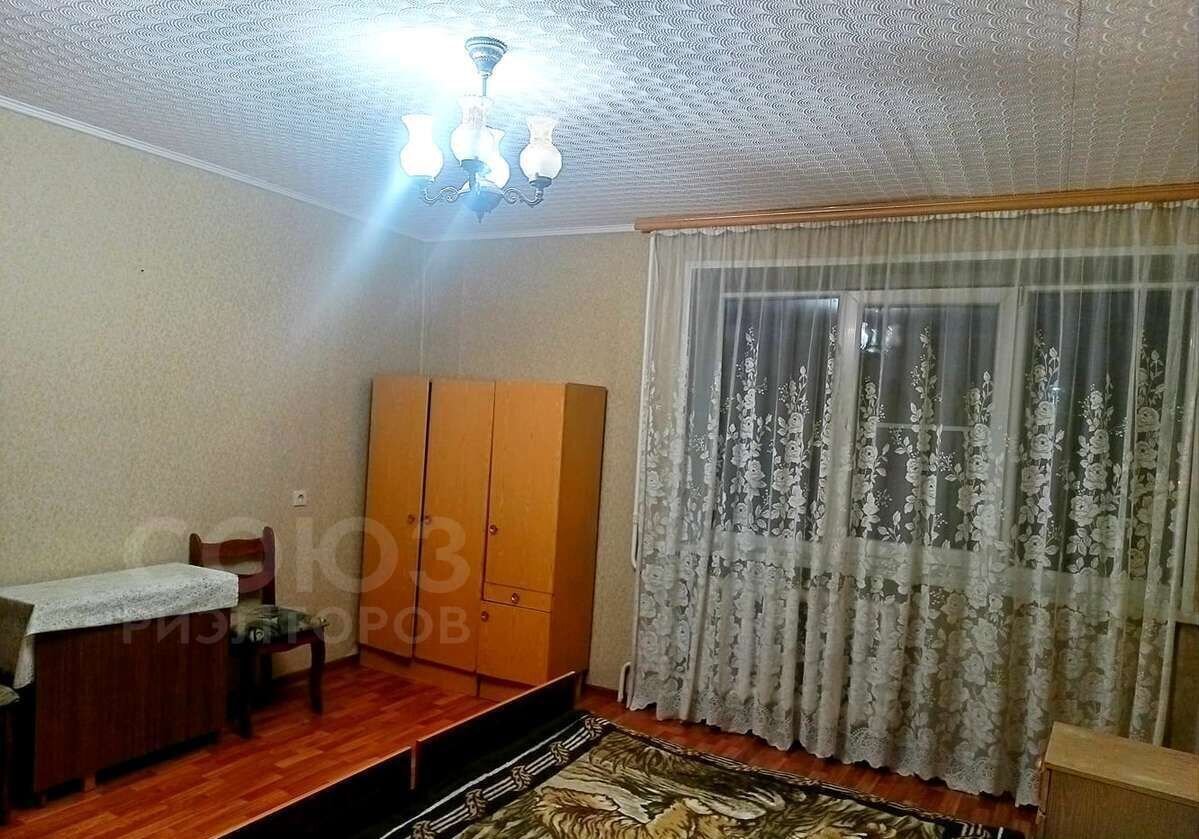 квартира г Волгоград р-н Ворошиловский ул им. милиционера Буханцева 66 фото 1