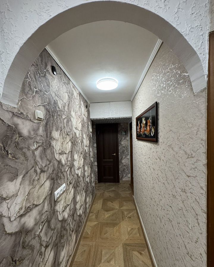 квартира г Волгоград р-н Кировский ул 64-й Армии 77 фото 18