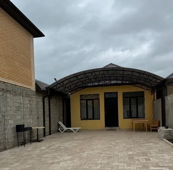 дом г Махачкала р-н Кировский микрорайон Караман-7 ул. Агамедова, 10 фото 1