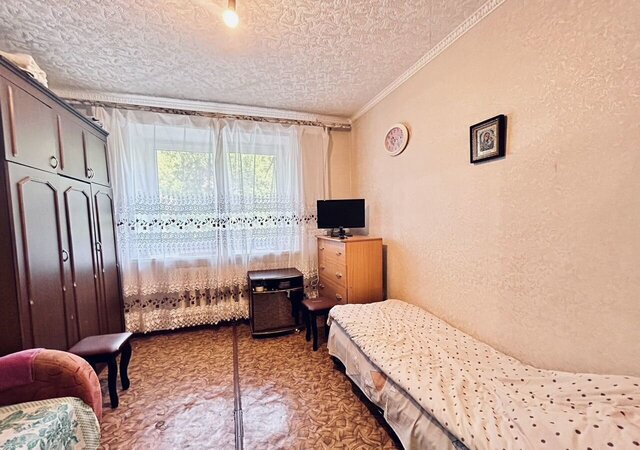 комната р-н Октябрьский ул Краснознаменная 2в фото