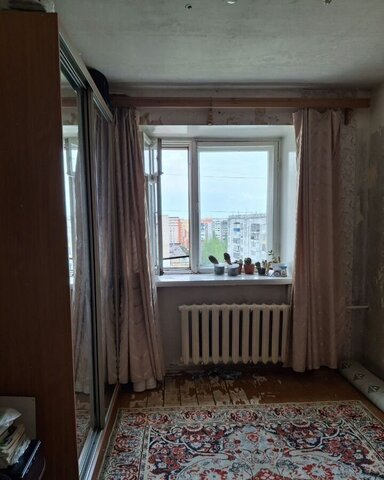 комната ул Строителей 60/2 фото